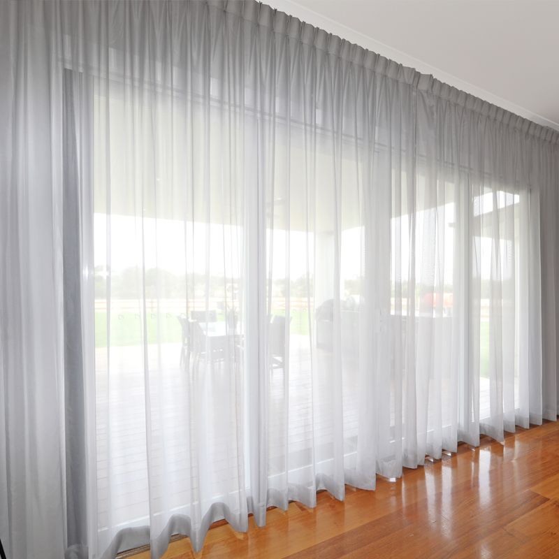 White S-Fold Sheer Curtains installed on Ceiling to floor