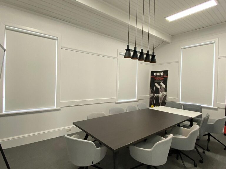 board room with block out roller blinds closed for privacy