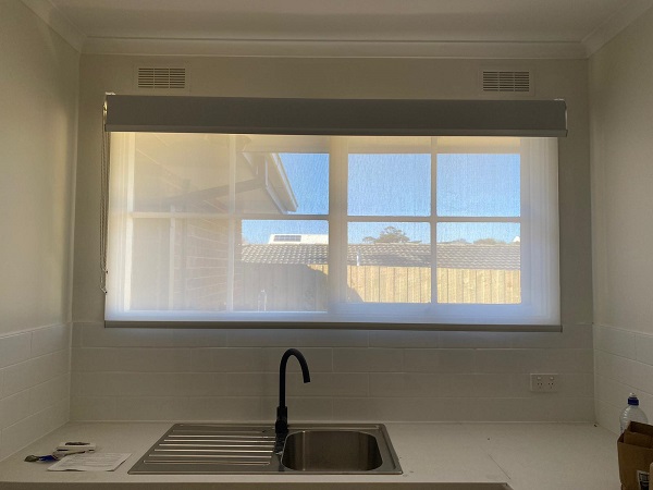 See through sunscreen roller blind installed in kitchen